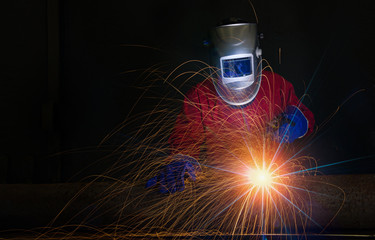 worker work hard with welding process in production plant
