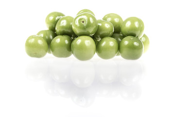 green plums on white