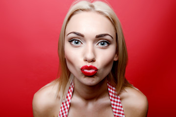 Young blond-haired woman with headphones 