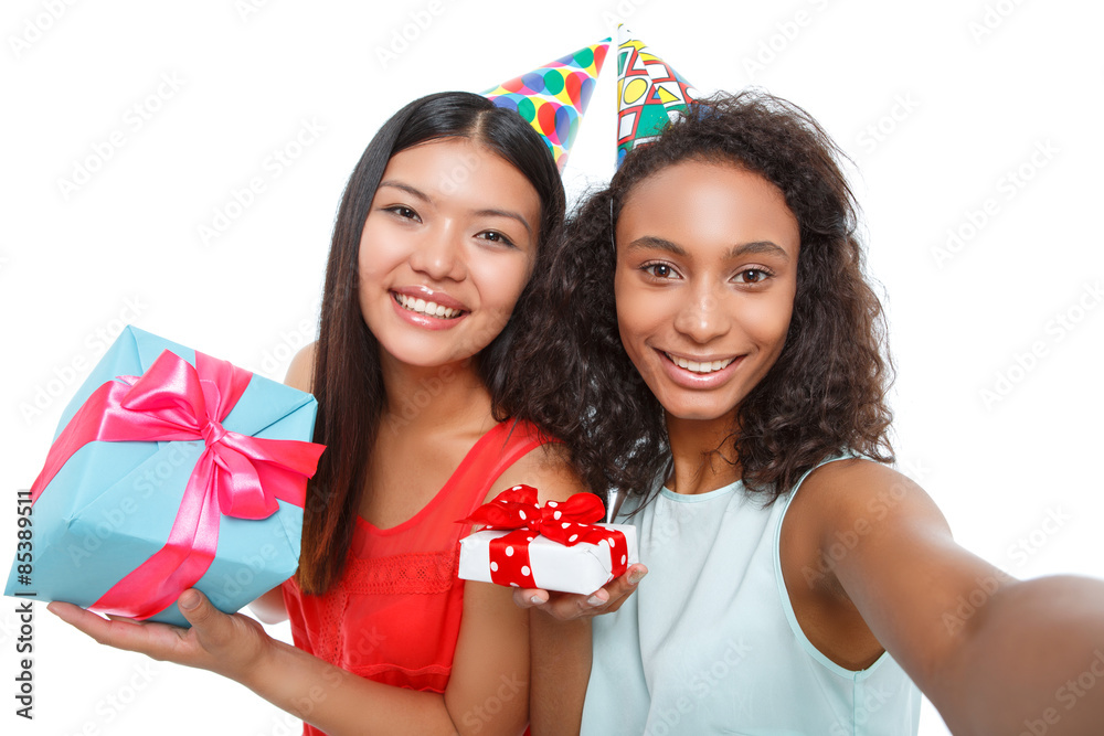 Wall mural cheerful girls holding birthday presents