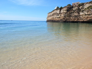 Calm beach, blue sky on a sunny day.
