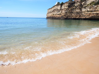 Calm beach, blue sky on a sunny day.
