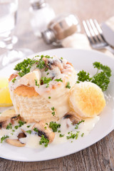 dining with mushrooms sauce and meat in pastry puff