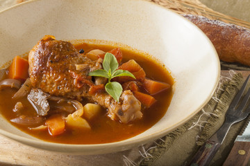 chicken stewed tomato sauce chicken stewed in a dish decorated on the table