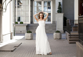 Obraz premium Full length portrait of beautiful model woman with long legs wea