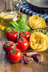 Italian and Mediterranean food ingredients on wooden backgroun 