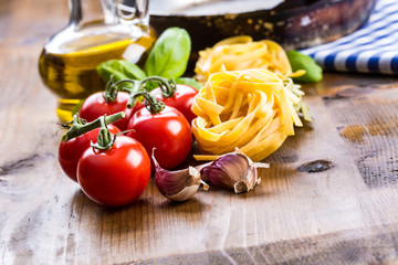 Italian and Mediterranean food ingredients on wooden backgroun 