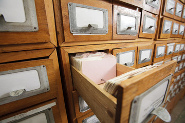 Obraz na płótnie Canvas A file cabinet drawer full of files