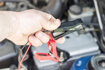 The process of connecting the charger to the the vehicle battery