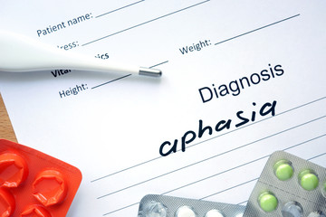 Diagnosis aphasia and tablets. Medicine concept.