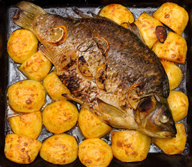 Baked fish with potatoes