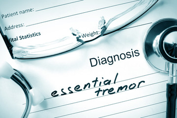 Diagnostic form with diagnosis Essential tremor and pills.