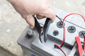 The process of connecting the charger to the the vehicle battery