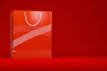 Rote Einkaufstasche vor Hintergrund