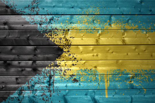 painted bahamas flag on a wooden texture