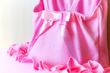 Girl's pink dress of delicate pink fabric