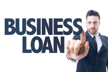 Business man pointing the text: Business Loan