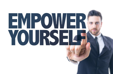 Business man pointing the text: Empower Yourself