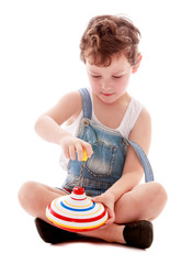 Little boy spins the spinner