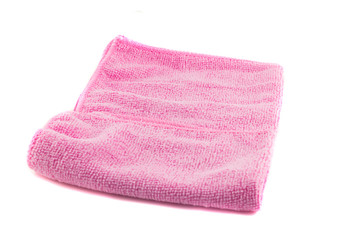 Pink towel folded in the shape of a square