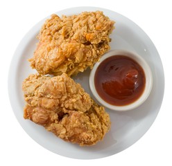 Deep Fried Chicken with Sauce on A White Dish