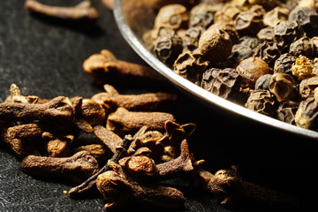 pepper and allspice seeds, macro photo