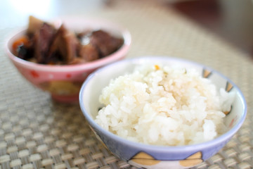 Bowl of white rice with Korean beef stew known as "kalbi jim."