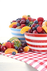 Fresh colorful fruit in breakfast bowls