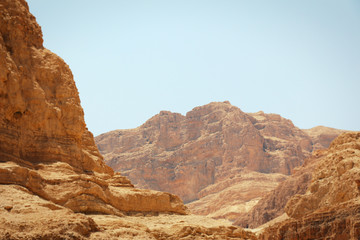 Fototapeta na wymiar Mountain in the desert. Scorcher. Ein Gedi, Nahal Arugot, Israel.