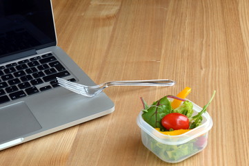 Salad at Busy Office Worker's Desk