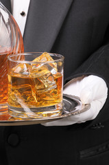 Butler holding Cocktail on tray