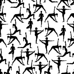 Seamless pattern. Yoga poses as seamless background. Background with women in black and white colors.  Black and white seamless background with girls in yoga poses. Yoga background.