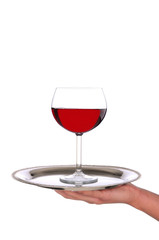 Waitress with wine glass on tray