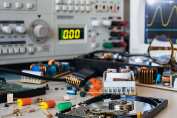 desk in electronic laboratories, faulty HDD and power supplies b