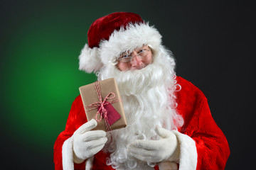 Santa Claus Holding Present