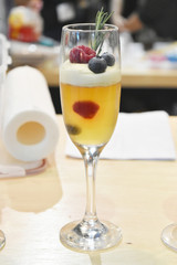 Glass of fruit drinks on table
