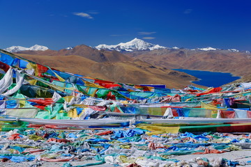 Prayer flags overlooking YamdrokTso-Lake. Kamba La-pass. Tibet. 1537