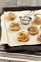 Pastry with apple shaped roses. Selective focus.