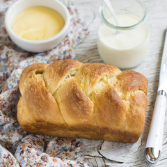 brioche on a light wooden background