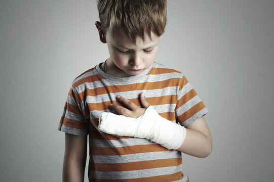 little boy in a cast.child with a broken arm.kid after accident