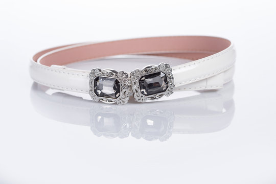 thin white female belt buckle with fine