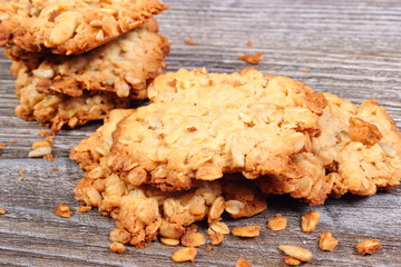 Oatmeal cookies on wooden background