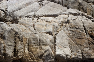Severe granite rocks on the sea coast