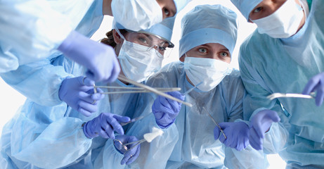 Team surgeon at work in operating room