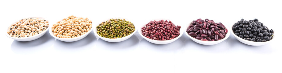 Beans variety in white bowl over white background