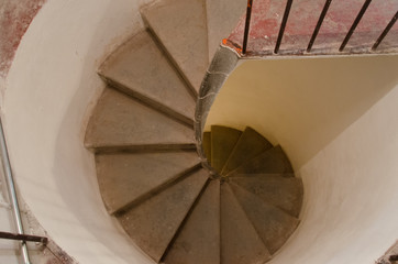 Obraz premium View of an old spiral staircase