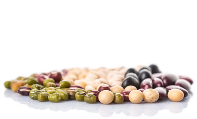 Variety of beans over white background