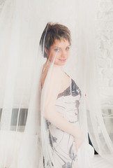 Beautiful woman in bed after waking up © OlgaKhorkova