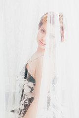 Lovely woman sitting in bed © OlgaKhorkova