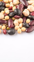 Variety of beans over white background